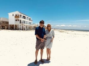 Owner Lebron Lackey and Elizabeth Hart standing on the beach